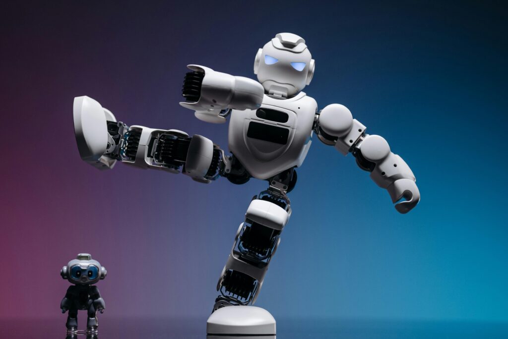 pexels photo 8294618 8294618 Close-up of two futuristic robots in a studio setting, showcasing advanced robotics and innovation.